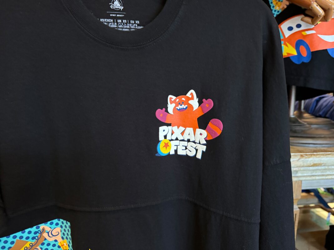 A close-up of the Pixar Fest logo on the front of the Spirit Jersey with Panda Mei.