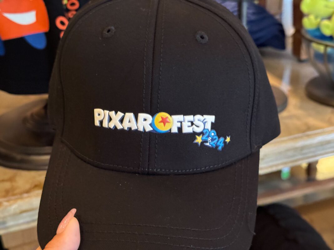 A close-up of the front panel of the Pixar Fest ball cap.