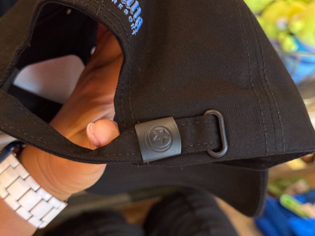 A close-up of the Pixar Ball on the ball cap hardware.