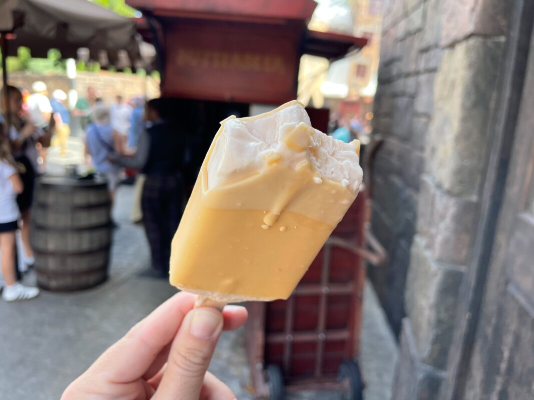 Half-eaten yellow popsicle