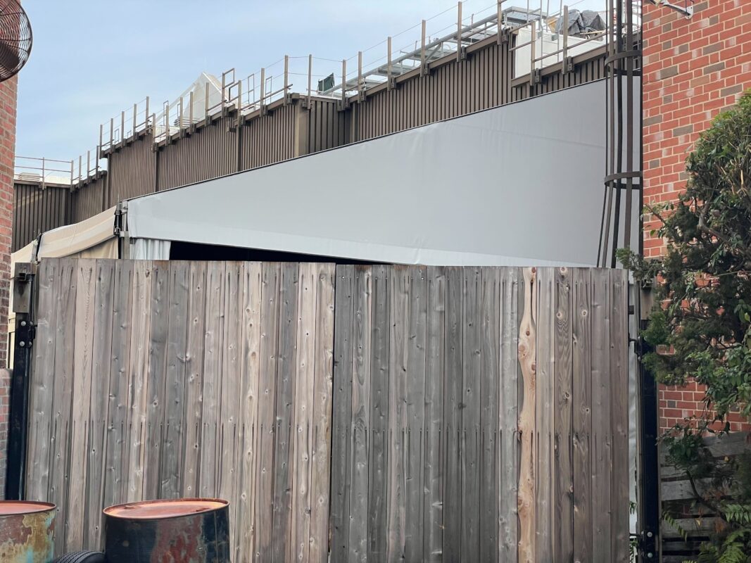 A closer look at the HHN tent behind the fence