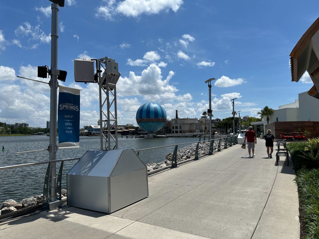 Speakers on scaffolding towers along Lake Buena Vista