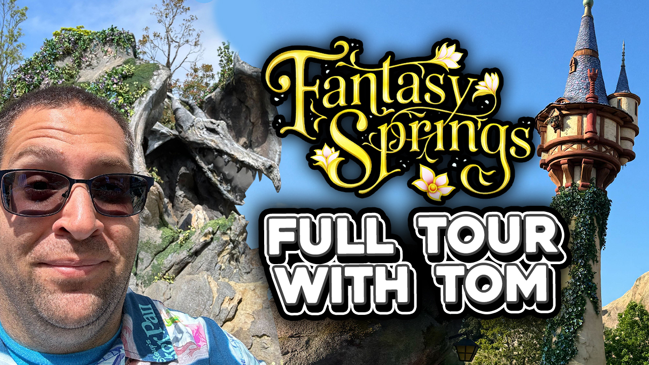A man wearing glasses smiles in front of a rocky scene and a tower. Text reads "Fantasy Springs Full Tour with Tom" as he introduces the magical journey.