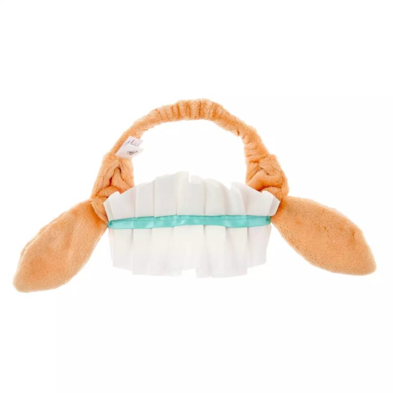 A headband featuring two large, plush brown ears on the sides and white, layered fabric resembling teeth in the center.