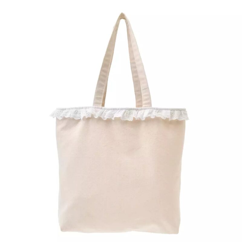 Image of a plain light pink tote bag with two handles and a frilled lace trim at the top.