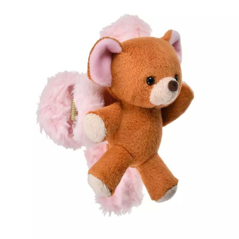 A brown teddy bear with light pink inner ears and feet is attached to a fluffy pink scrunchie.