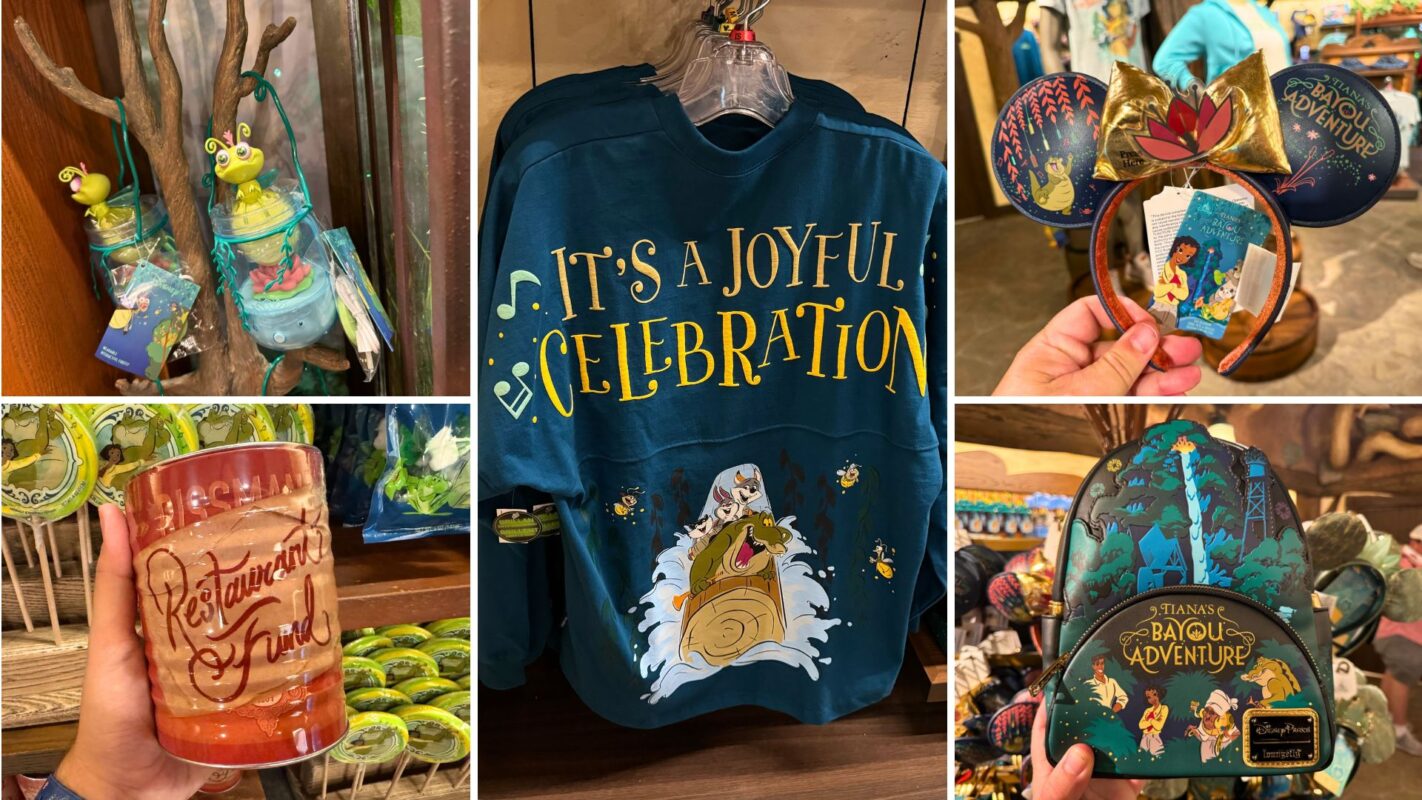 Merchandise display featuring a "Princess and the Frog" themed drink cup, blue shirt with "It's a Joyful Celebration" text, frog-inspired toys, Tiana's Bayou Adventure mouse ears, and a Tiana ornament.