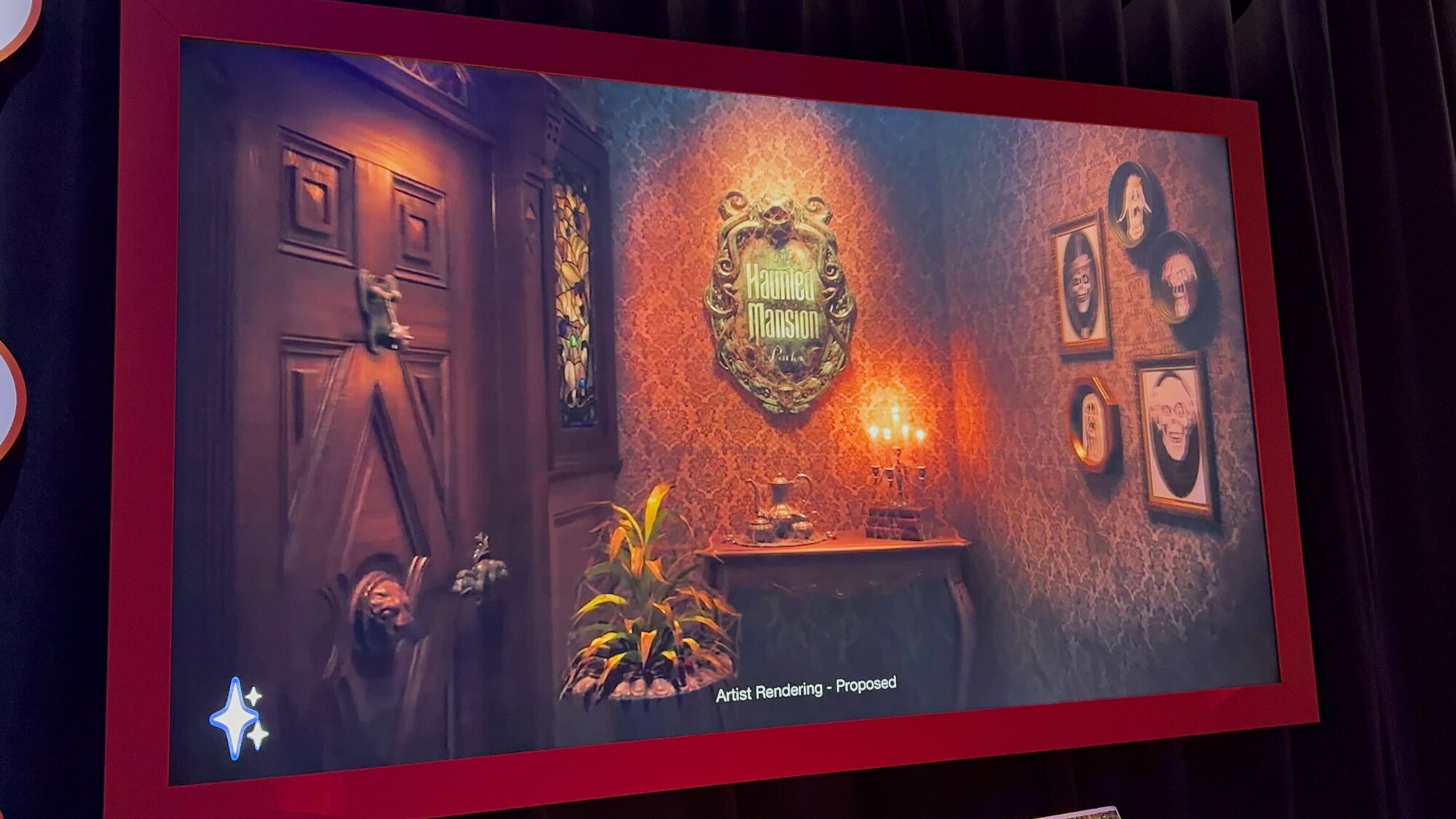 A framed image display shows a rendering of a Victorian Gothic interior with a "Haunted Mansion" sign, old portraits, a wooden door, and eerie lighting. The image is labeled "Artist Rendering - Proposed.