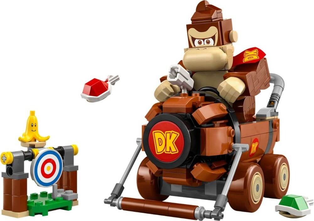 A Donkey Kong-themed LEGO set featuring Donkey Kong in a car, a target with a banana on top, and two projectiles resembling red and green shells, all within the vibrant world of Super Mario.