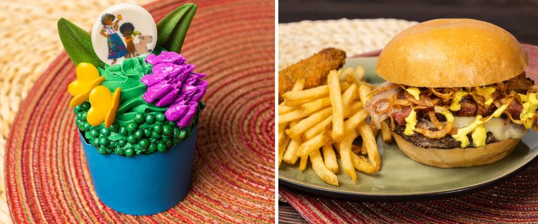 A colorful cupcake with leaf decorations and a button next to a plate with a burger, a side of French fries, and a fried stick – perfect treats to enjoy during Hispanic and Latin American Heritage Month.