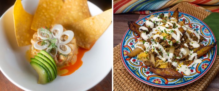 A white bowl with nachos, avocado slices, onion rings, and a dip sits next to a colorful plate of loaded fries with cheese, cream, and herbs on a woven placemat—an ideal feast to celebrate Hispanic and Latin American Heritage Month.