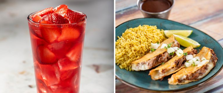A glass of strawberry drink on the left, and a plate of tacos with rice, lime wedges, and sauce on the right celebrate Hispanic and Latin American Heritage Month with a delicious spread.