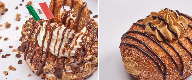Close-up of two gourmet doughnuts: one with whipped cream, chocolate drizzle, nuts, and a small Mexican flag celebrating Hispanic and Latin American Heritage Month; the other with a peanut butter topping and chocolate drizzle. A delightful treat for any Food and Beverages enthusiast!