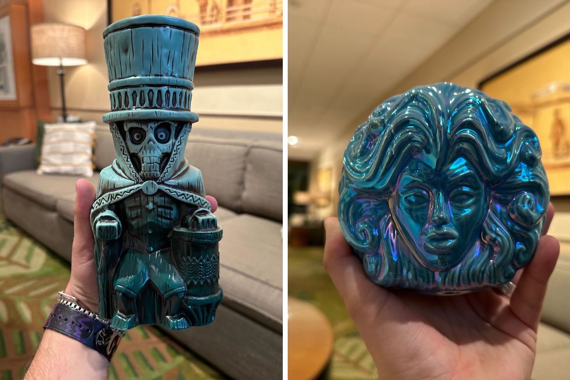 Two ceramic sculptures: a top-hat-wearing skeleton, reminiscent of the enigmatic Hatbox Ghost, and a woman's face, both in glossy blue and green hues, held in separate hands indoors.