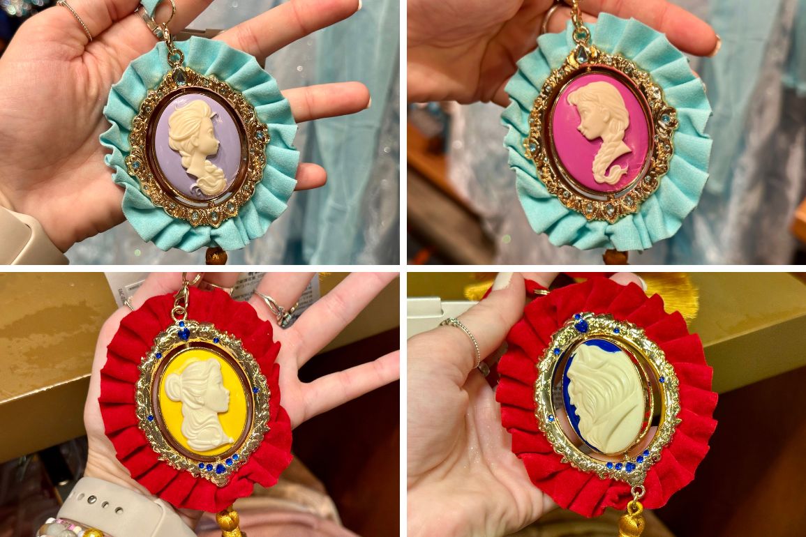 Four cameo-style brooches with different colored backgrounds and ribbons, each featuring a silhouette of a woman in profile.