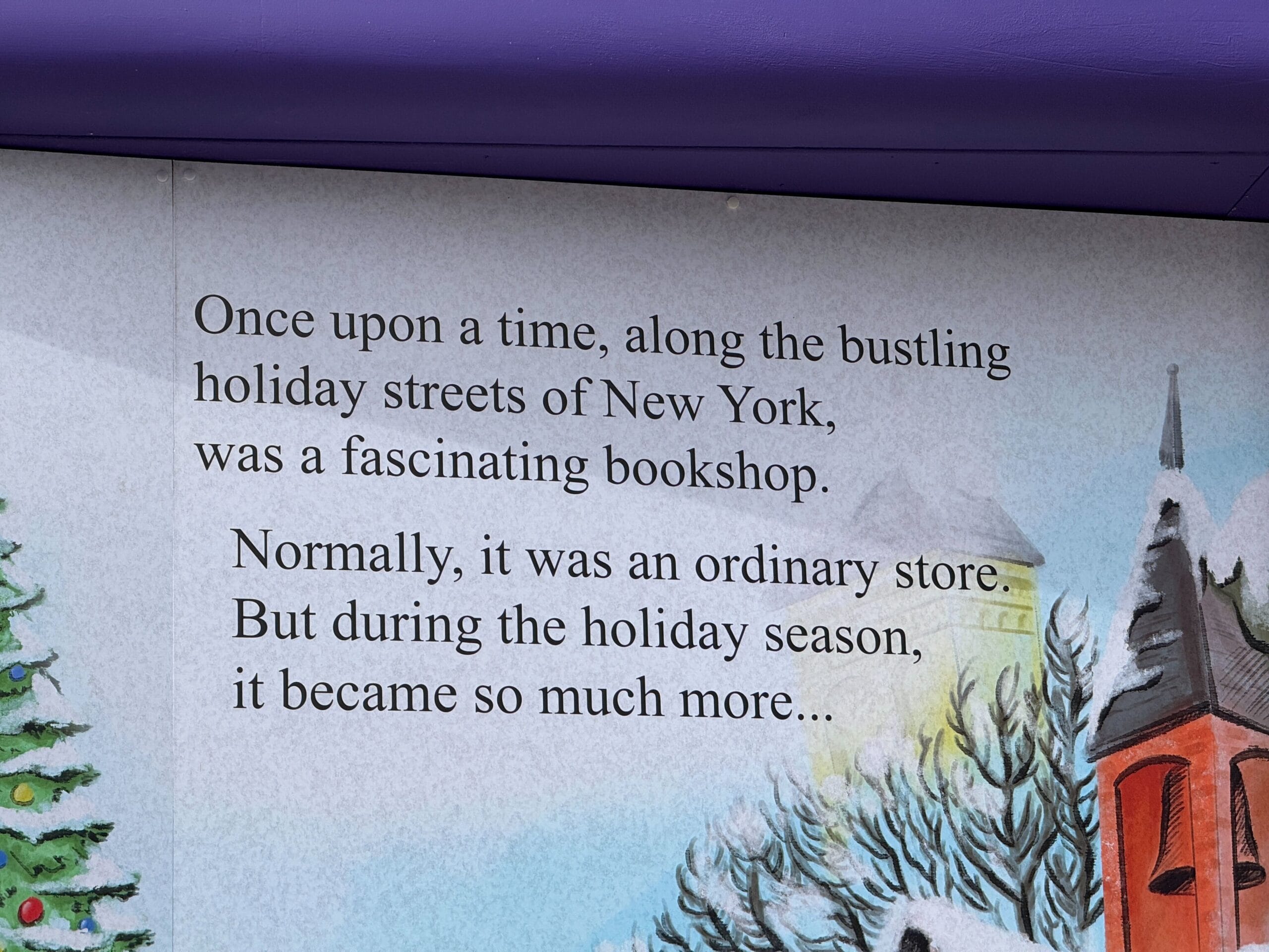 Text on a mural reads: "Once upon a time, along the bustling holiday streets of New York, was a fascinating bookshop. Normally, it was an ordinary store. But during the holiday season, it became so much more...
