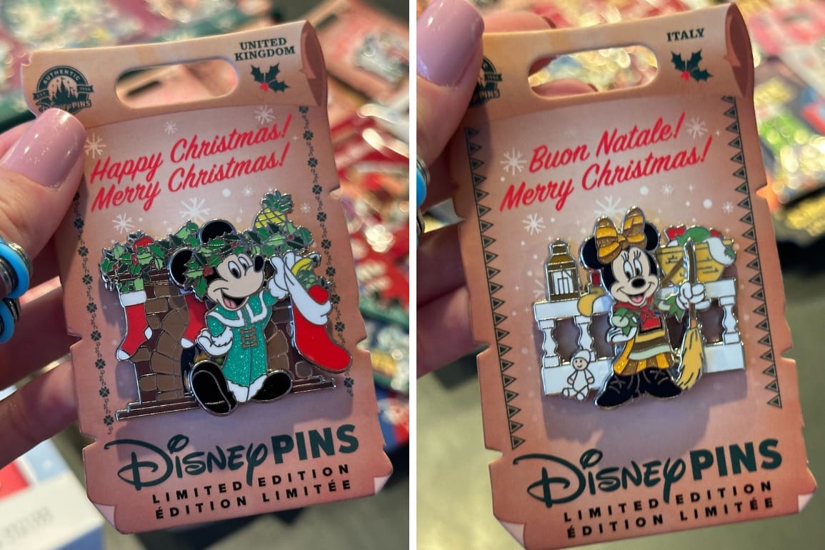 Two Disney Christmas pins featuring Mickey Mouse. One pin is from the UK and the other from Italy, each with respective holiday greetings.