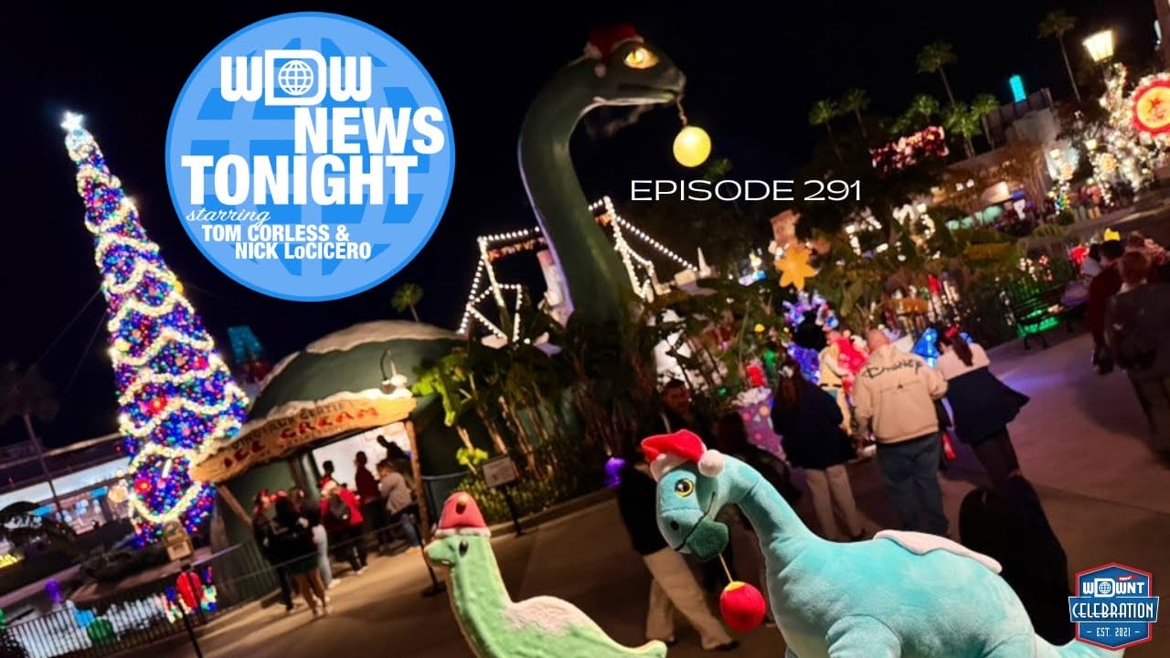 The nighttime amusement park scene dazzles with Christmas decorations. A large green dinosaur clutches an ornament, and the familiar blue logo for WDW News Tonight graces the sky, adding to the festive atmosphere.