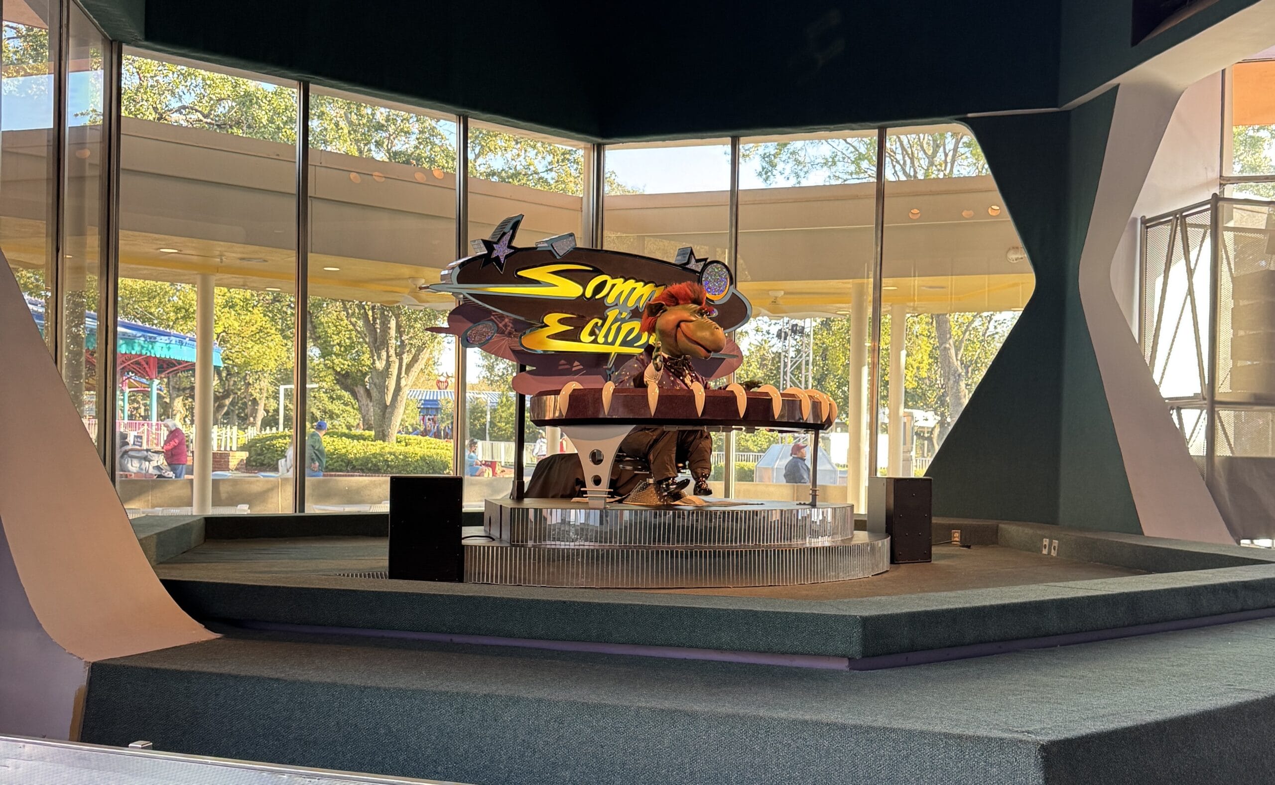 In the Magic Kingdom, an animatronic character dazzles audiences as he plays a keyboard beneath a glowing "Sonny Eclipse" sign, captured beautifully in our 12/7/2024 photo report from the vibrant theme park.