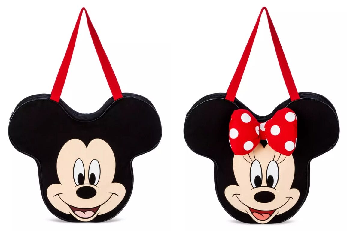 Two Mickey Tote bags shaped like character faces. One features a face with a red bow, the other without. Both have bold red handles, perfect for carrying your essentials in playful style.