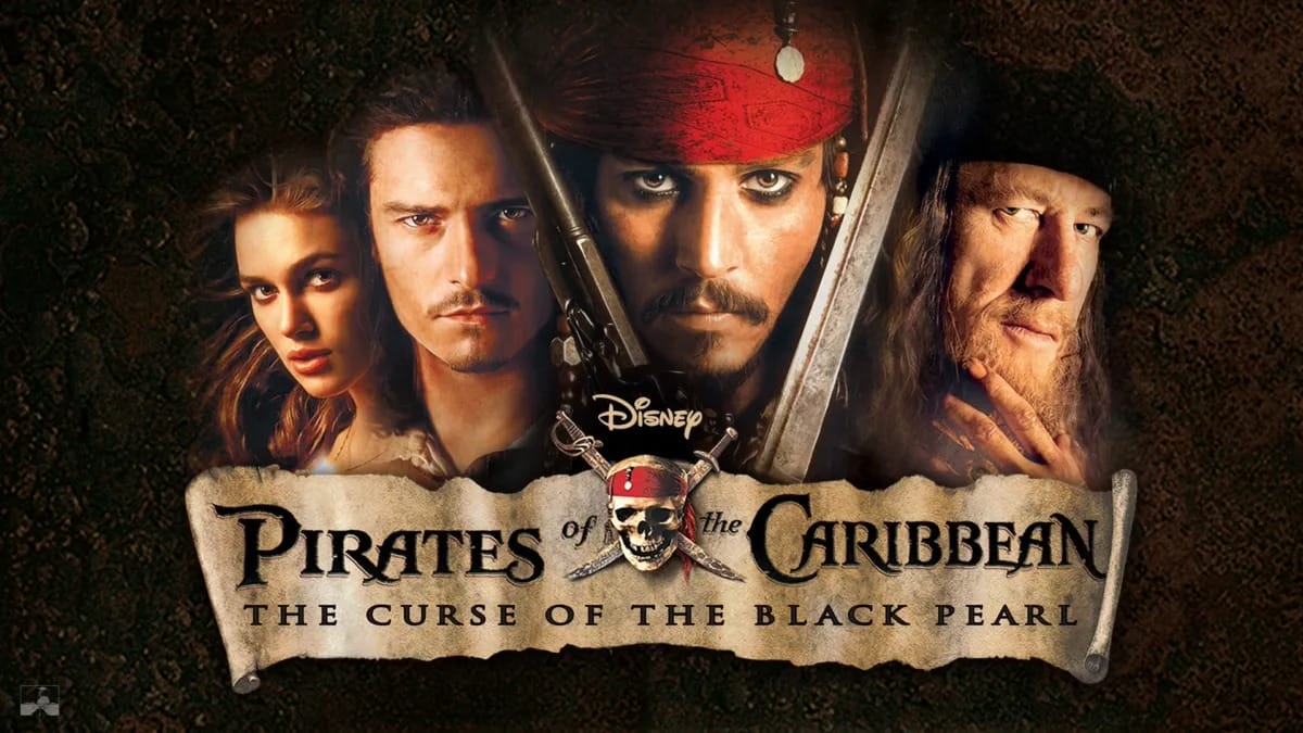 Four main Pirates of the Caribbean characters stand above the movie title from The Curse of the Black Pearl.