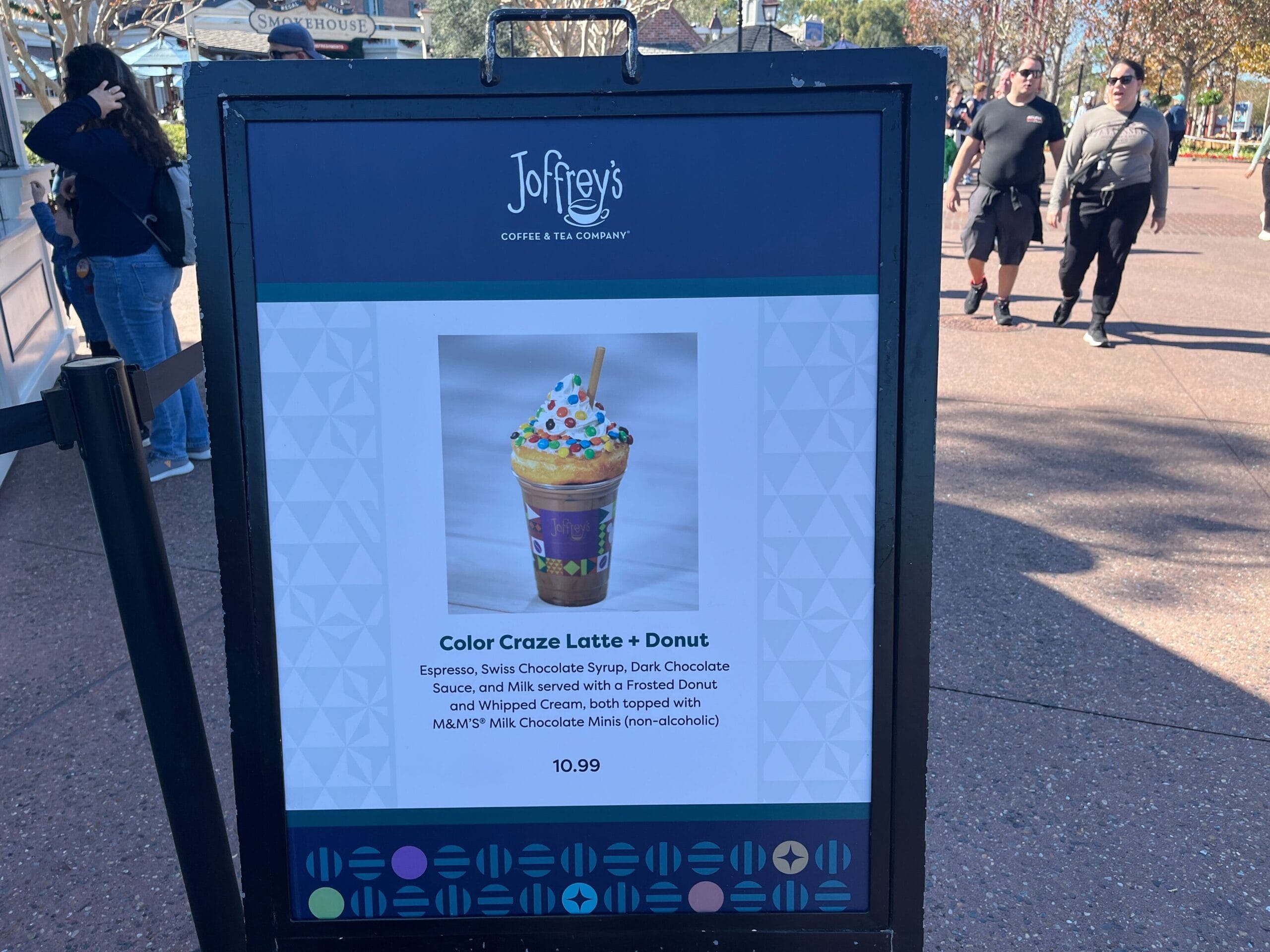 Sign in front of a coffee shop celebrating the Festival of the Arts with an offer for their "Color Craze Latte + Donut," priced at $10.99.