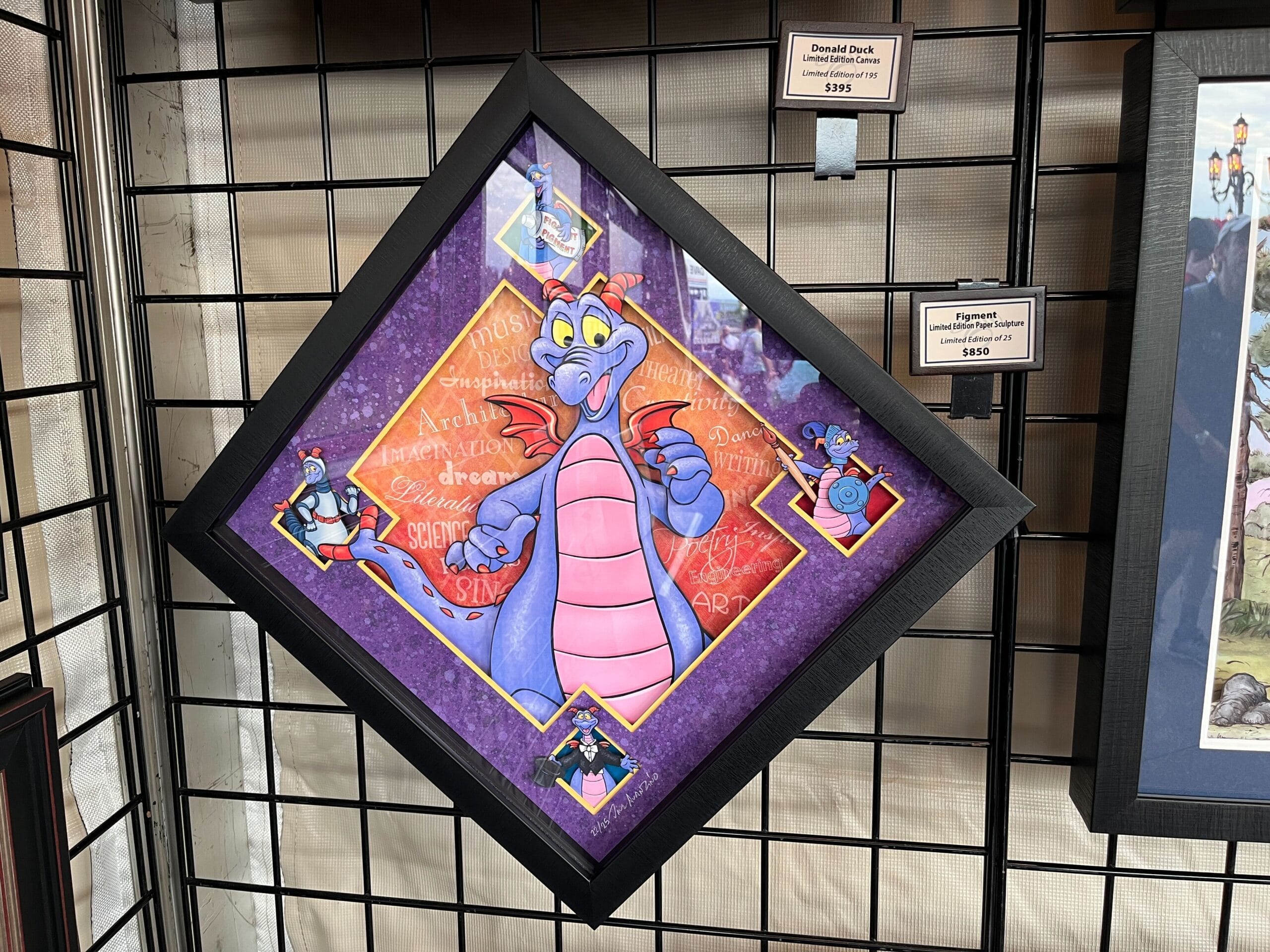 Framed artwork by Dave Avazano featuring a purple dragon on a diamond-shaped frame with smaller images. This stunning piece is displayed on a grid wall at the EPCOT Festival, complete with price tags for eager collectors.