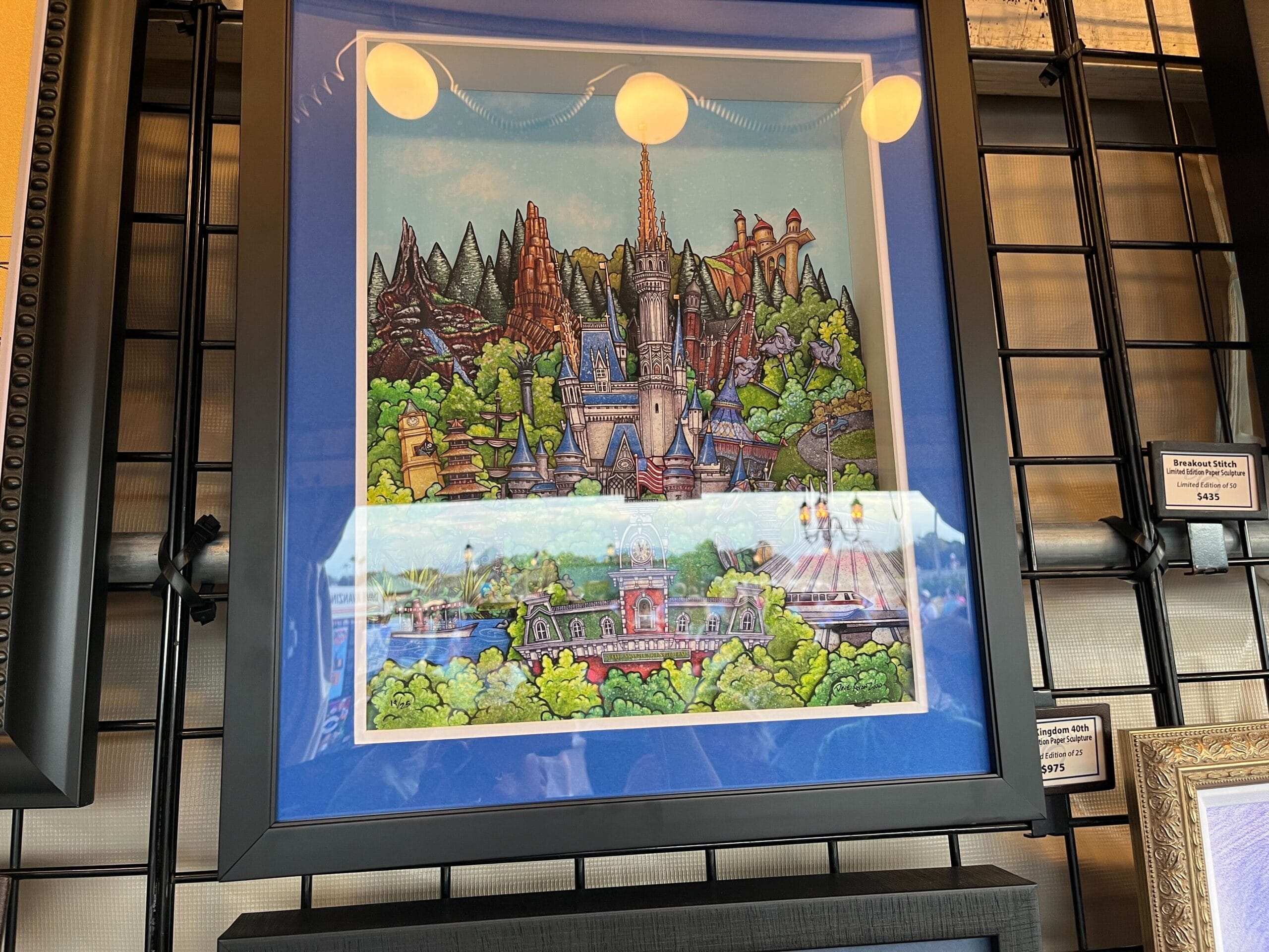 Framed artwork by Dave Avazano, depicting a colorful, cartoon-style fantasy landscape with a castle and vibrant scenery, showcased at the EPCOT Festival of the Arts 2025 on a grid wall.