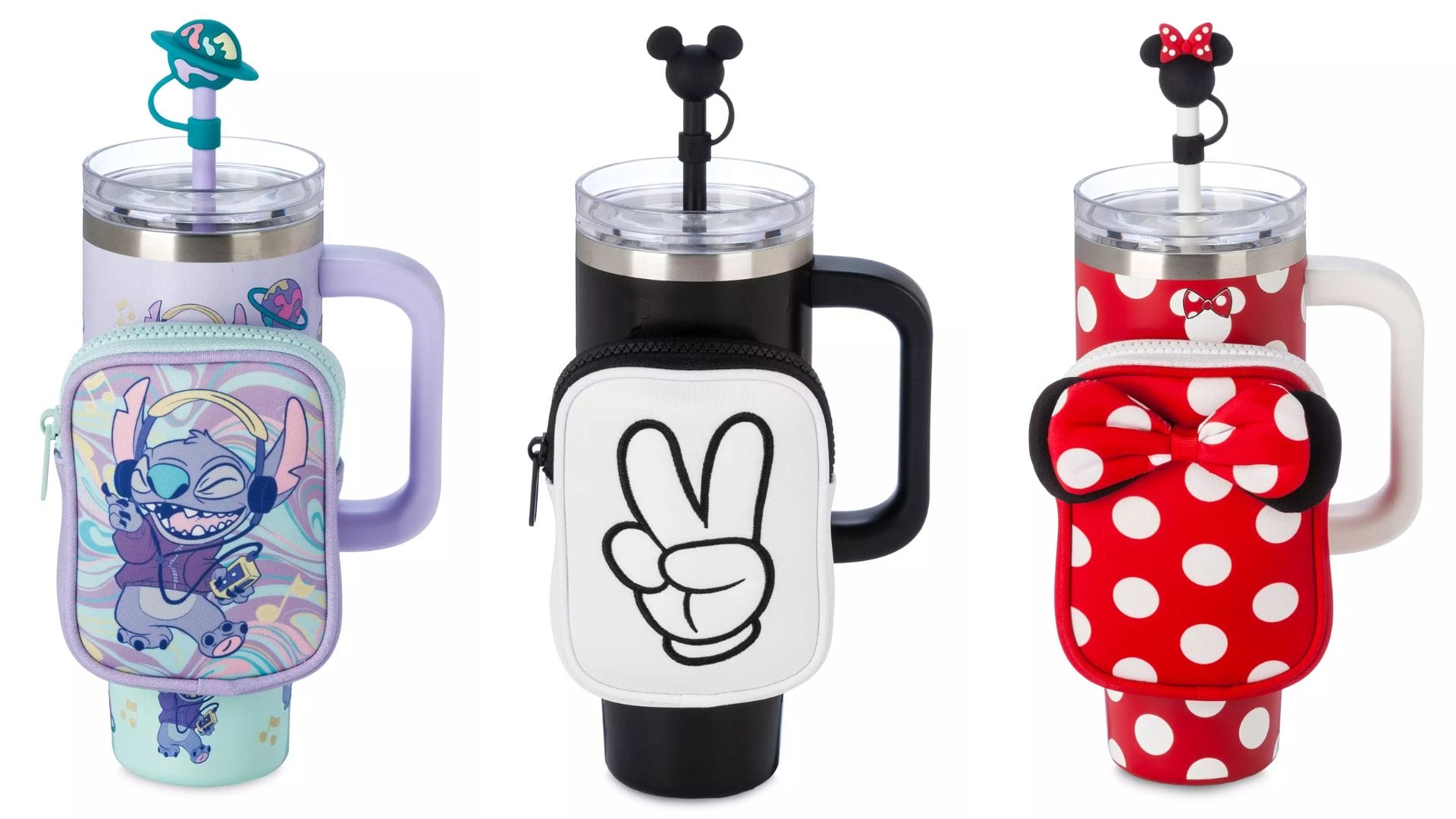Three character-themed tumblers with handles and designs: a pastel cartoon, black with a peace sign, and red with white polka dots reminiscent of Minnie. Each comes with a small matching zip pouch.