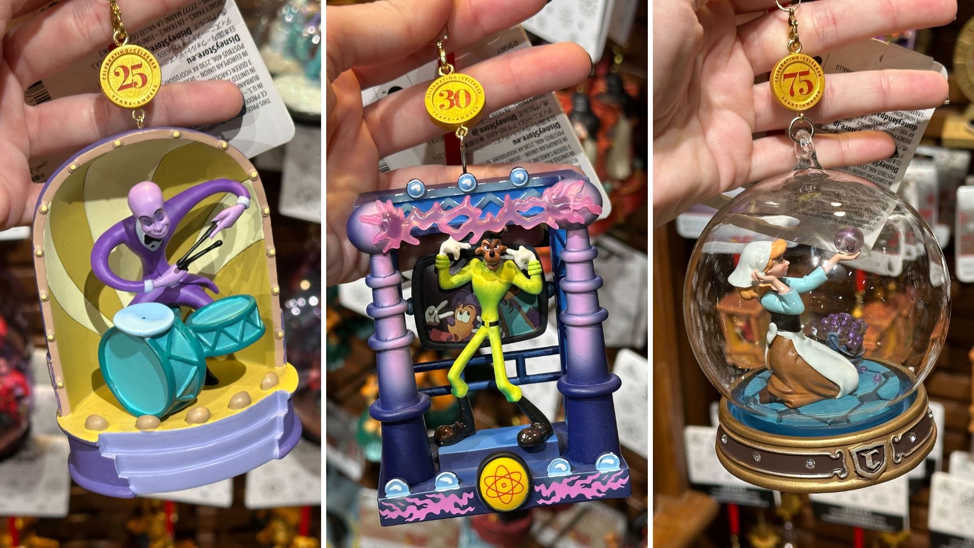Three whimsical ornaments boasting cartoon characters: a purple octopus drummer, a lively dancer in green, and a charming figure encased in a snow globe. Each delightful ornament is adorned with a quaint coin tag.