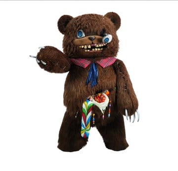 A large, stylized bear costume with textured fur, mismatched eyes, sharp teeth, and claws. It resembles Hamikuma from Universal Japan's Halloween Horror Nights with a plaid collar and vibrant, colorful patterns on its stomach area.