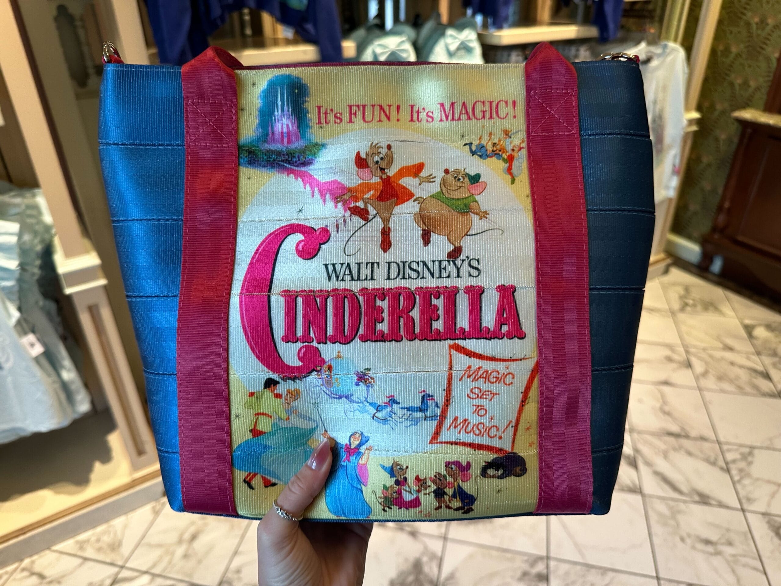 This Cinderella Harveys Bag, inspired by Walt Disney's enchanting tale, features beloved characters and phrases like "It's fun! It's magic!" Exclusively available at Magic Kingdom Park, it's a must-have treasure as it quickly sold out online.