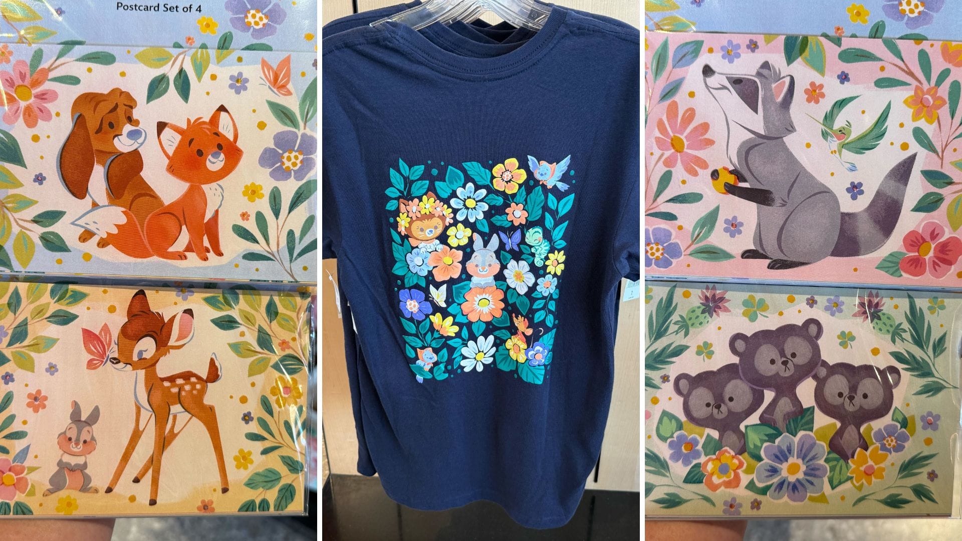 A navy T-shirt featuring floral designs accompanies postcards from the Disney Animal Pals Collection, showcasing cartoon animals: a fox with a rabbit, a raccoon, and three koalas surrounded by flowers.