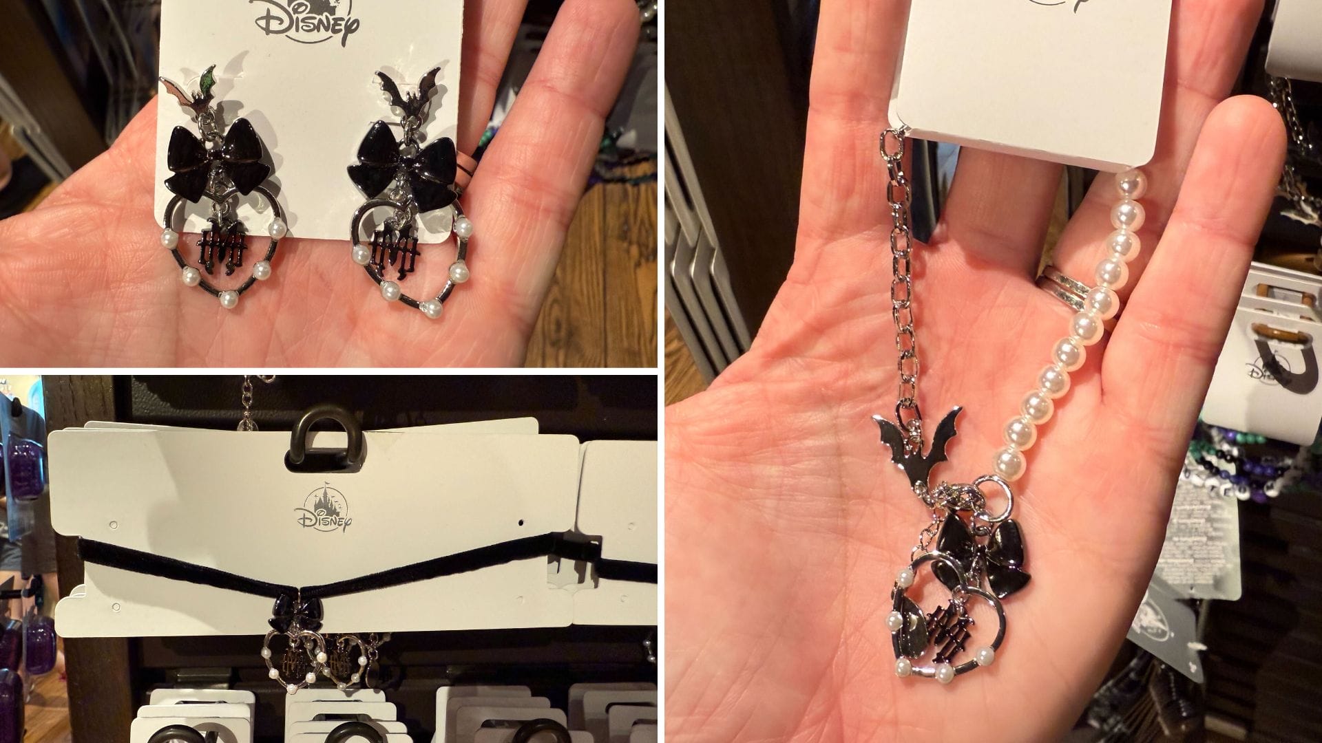 Jewelry with black bat and crystal details, including earrings and a necklace with pearl accents, reminiscent of the Haunted Mansion's enchanting allure, displayed on cards and held in hand.