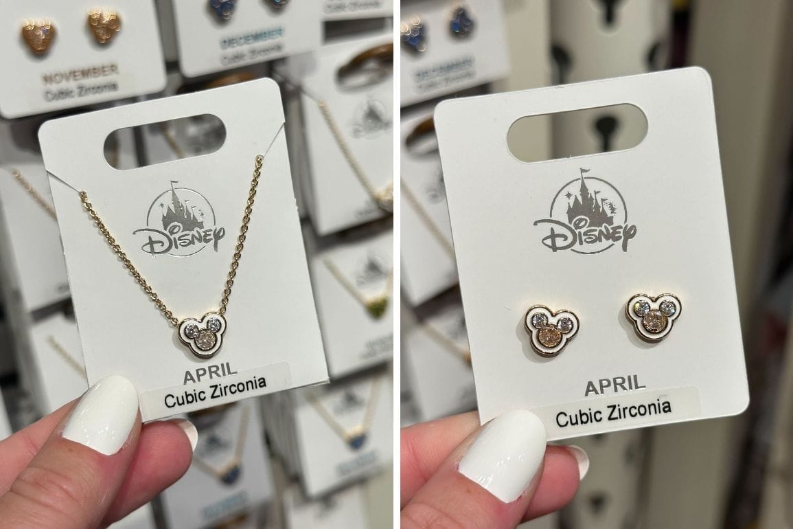 Two images showcase Mickey Birthstone Jewelry with cubic zirconia shaped like Mickey Mouse. Left: a necklace labeled "April." Right: earrings labeled "April." Perfect for Walt Disney World fans, these pieces celebrate the magic of Disney in elegant style.