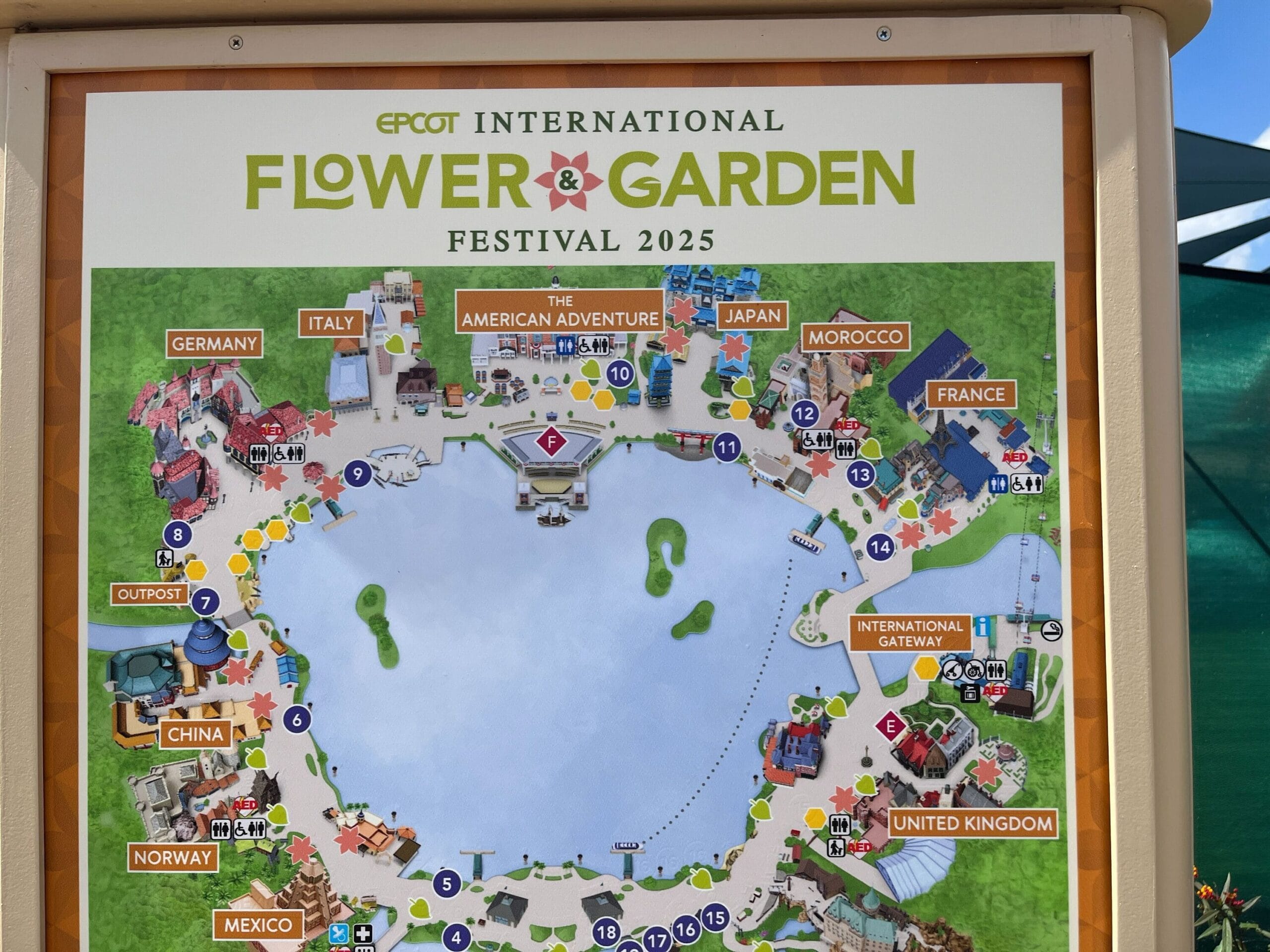 Explore the vibrant EPCOT International Flower & Garden Festival 2025 with this map, showcasing diverse country-themed locations beautifully arranged around a serene central lagoon.