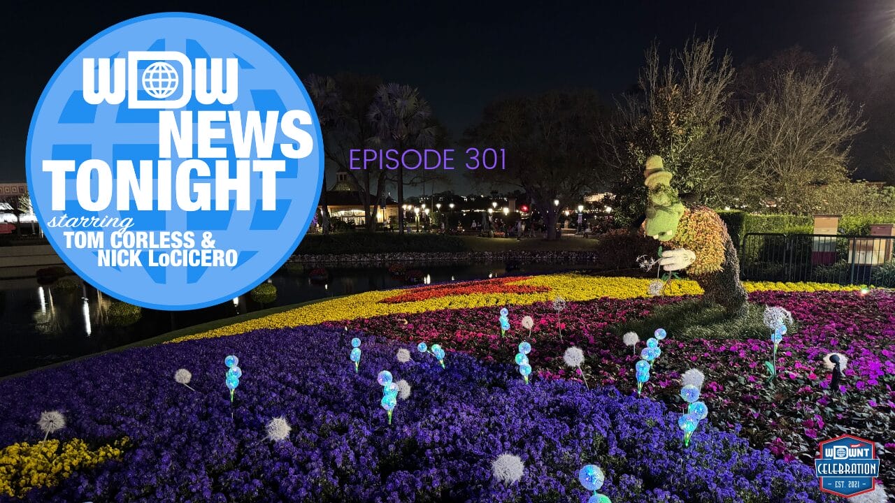 A lit flower bed at night with a Mickey Mouse topiary celebrating 70 years of magic. A sign reads "WDW News Tonight Episode 301 starring Tom Corless & Nick LoCicero.