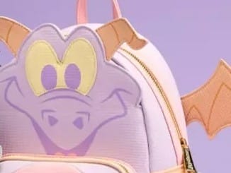 The pastel-colored Figment Loungefly backpack is shaped like a playful dragon, complete with large eyes and orange wings set against a purple background, capturing the whimsy of imagination.