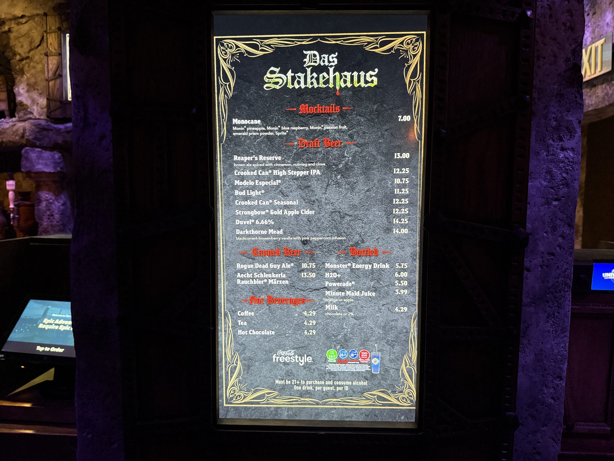The Das Stakehaus digital menu showcases drink options and prices, featuring mocktails, draft beer, and hot drinks.