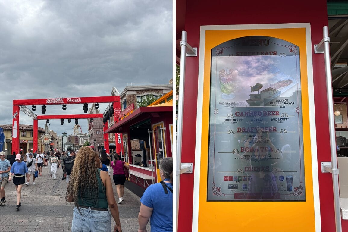 People stroll beneath a "Coke Zone" banner, exploring the Street Eats Menu featuring burgers, draft beer, and soda. Cloudy skies loom over this Universal Studios Florida scene.