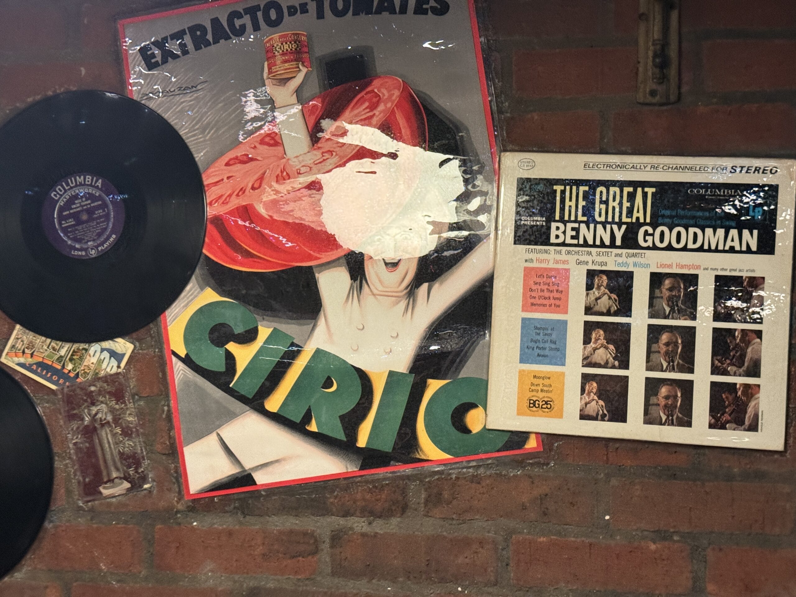 Vintage posters and vinyl records at Mama Melrose’s Ristorante Italiano, perfect for unique photos at Disney's Hollywood Studios.