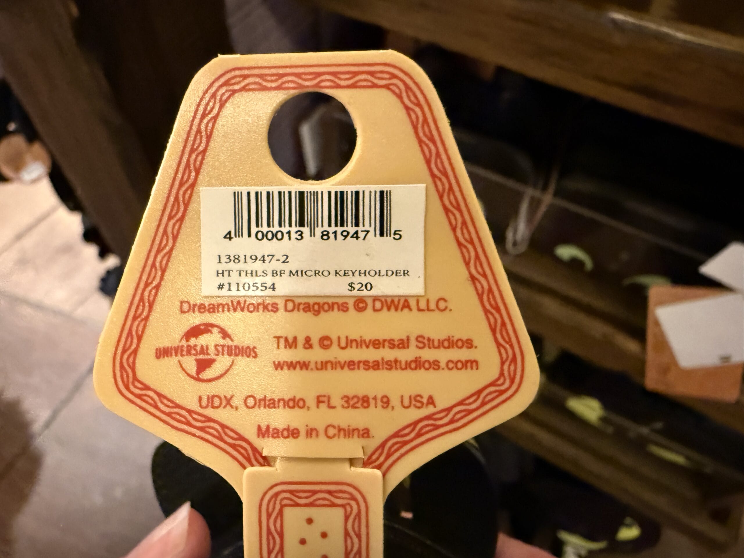 Cozy booth with red seats, vintage posters, and vinyl on brick—just like Mama Melrose’s Ristorante Italiano at Disney's Hollywood Studios.