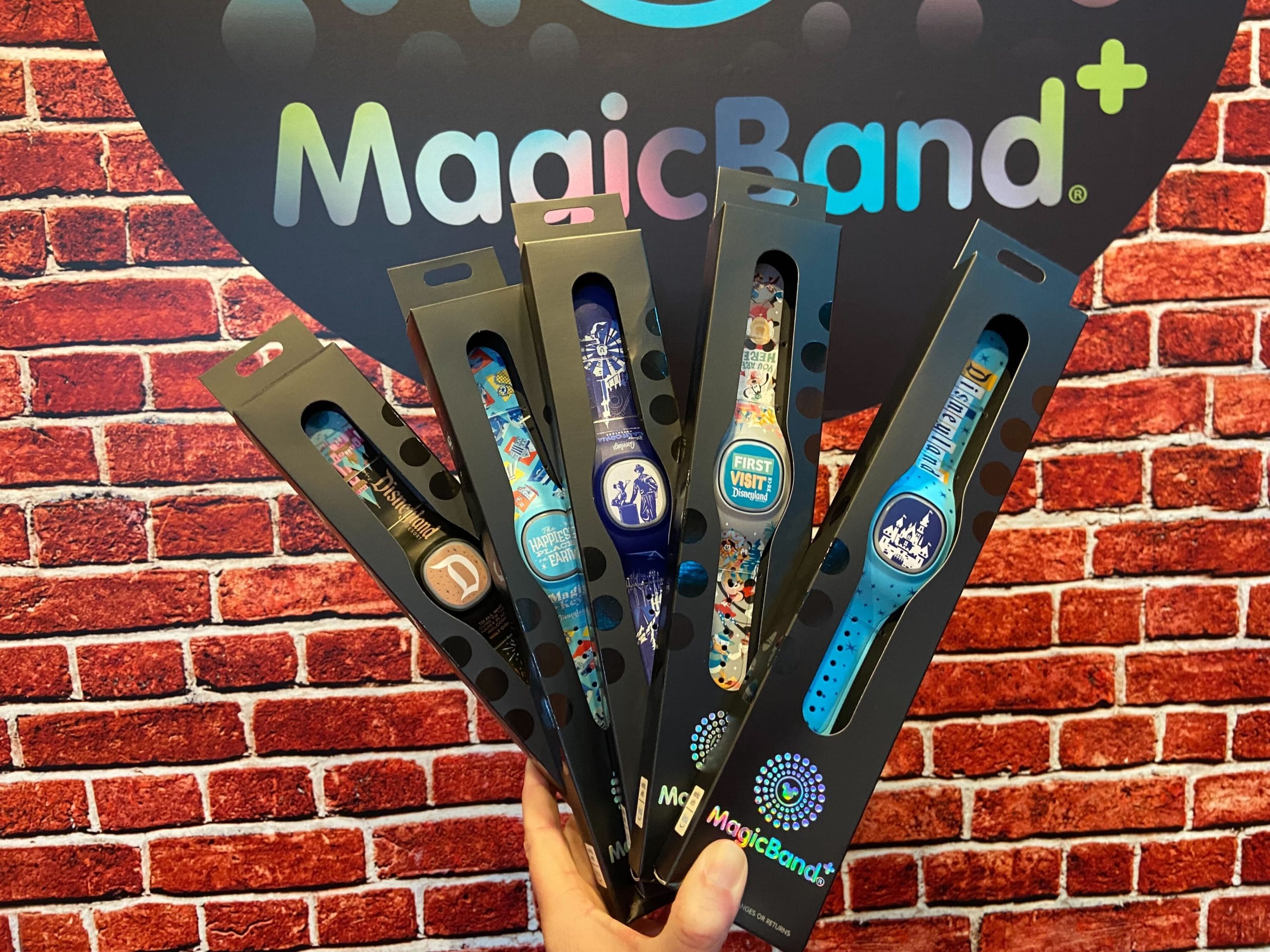Five colorful Disney Magic Band+ wristbands, ready to transform any vacation