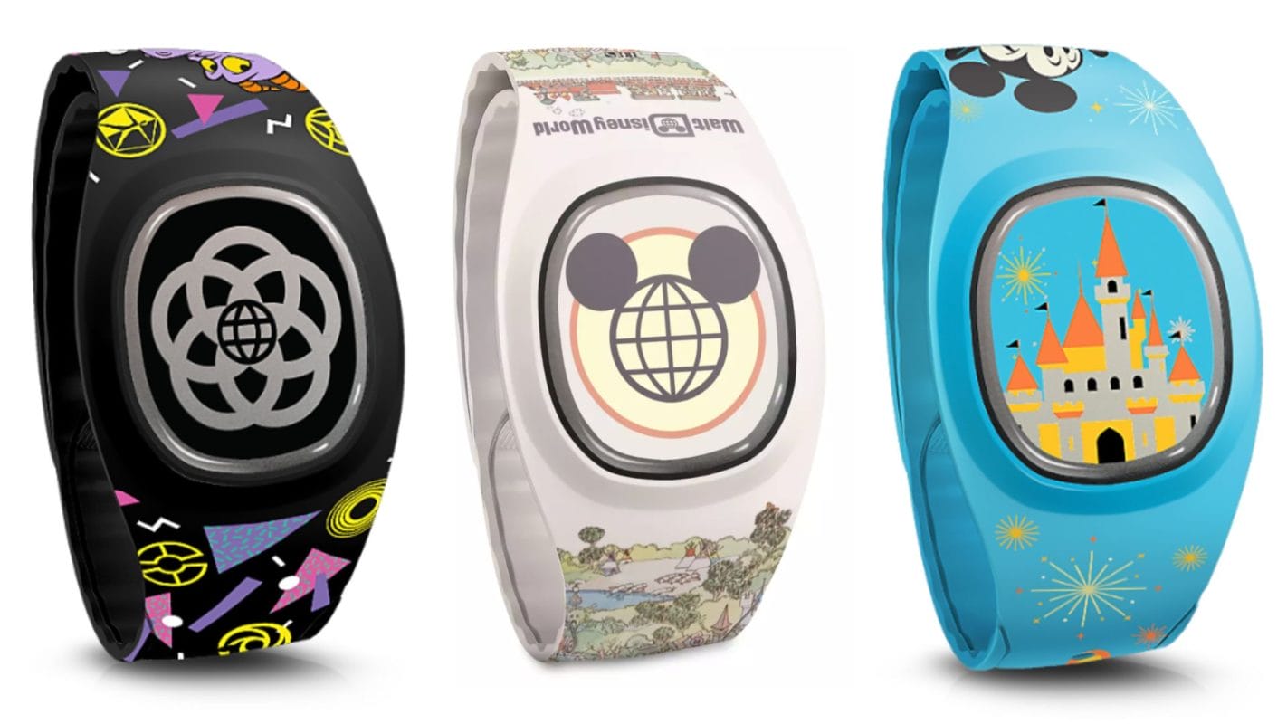 Three Disney Magic Bands with colorful designs and park icons