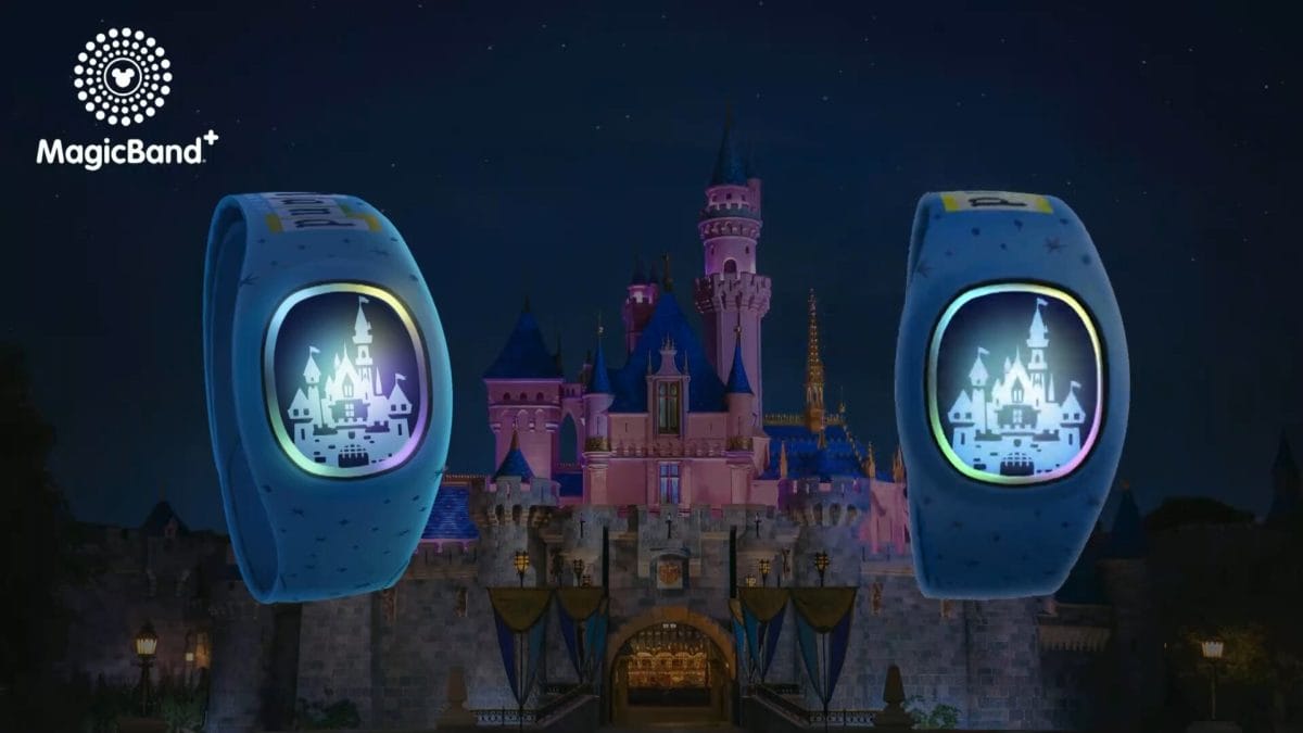 Two Disney Magic Band wristbands glow at Disneyland