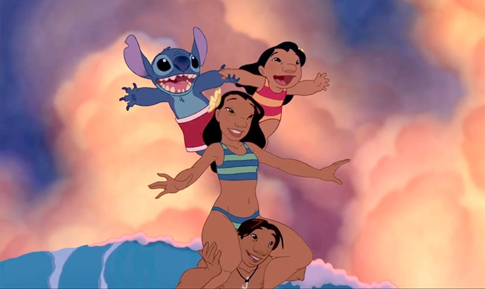 Four characters joyfully surfing a wave beneath a colorful sky, perfect as a fun Stitch wallpaper or for free downloads.