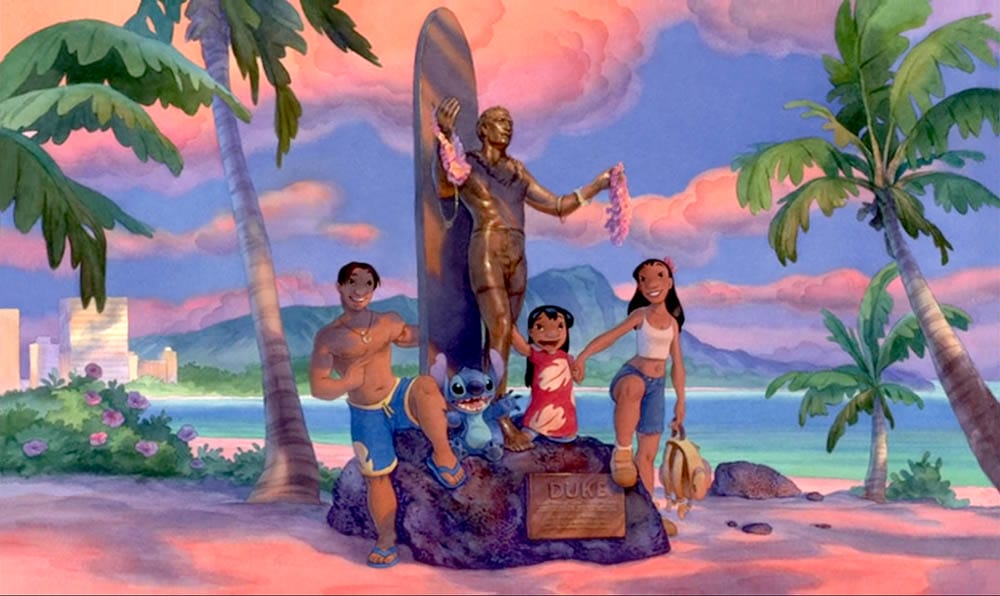 Animated Stitch wallpaper featuring characters by a surfboard statue on a tropical beach at sunset. Free downloads available.