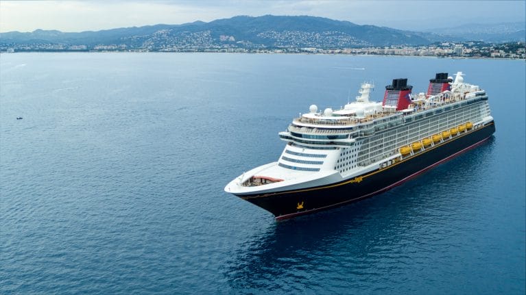 A Disney Cruise Line sails on calm blue water for breaking news child fell overboard disney cruise