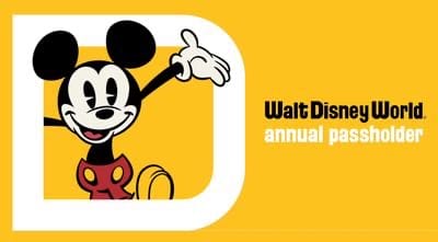 Mickey Mouse waving next to "Walt Disney World annual passholder" Disney World park hopper rules
