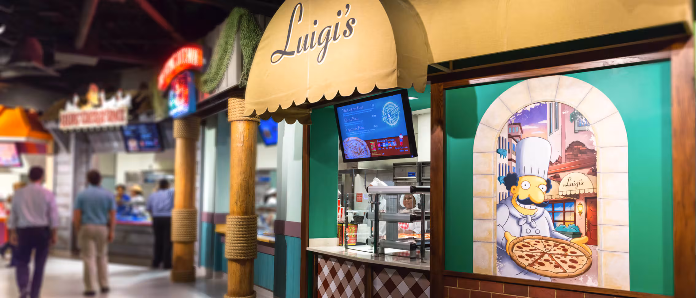 Luigi's pizza shop with cartoon chef holding a pizza, serving Italian food in a bright food court with people walking by.